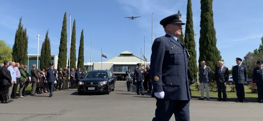 Therese funeral_p1_web Thérèse departing the Air Force Museum for the final time, as a C-130 Hercules flies overhead in salute. Image: Corporal Ian Brown, RNZAF.