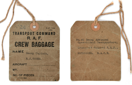 Baggage label of Group Captain Ronald Cohen Baggage label used by Group Captain Ronald Cohen when travelling to RAF Buckeburg in Germany. From the collection of the Air Force Museum of New Zealand.
