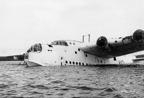 PR2183-R1-19-59 Salvage of Maritime Operational Conversion Unit Sunderland, NZ4111, after it was holed and sank in Te Whanga Lagoon, Chatham Islands. Sunderland lying low in the lagoon.