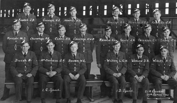 MUS05091 Group. Number 21a Pilots course, No. 1 Elementary Flying Training School, RNZAF Station Taieri. L-R: Back; JR Kingan, RJ Glennie, HD Hampton, HA Mullins, NBH Newton, JR Rodgers. Middle; MD Knight, NR Crompton, AS Clark, RWP Cameron, AL Rankin, JA Scott, GK Paterson, TG Smith. Front; A Divers, JA McConnell, WE Davers, LGH Wilson, DR Warlow, AG Wigley.