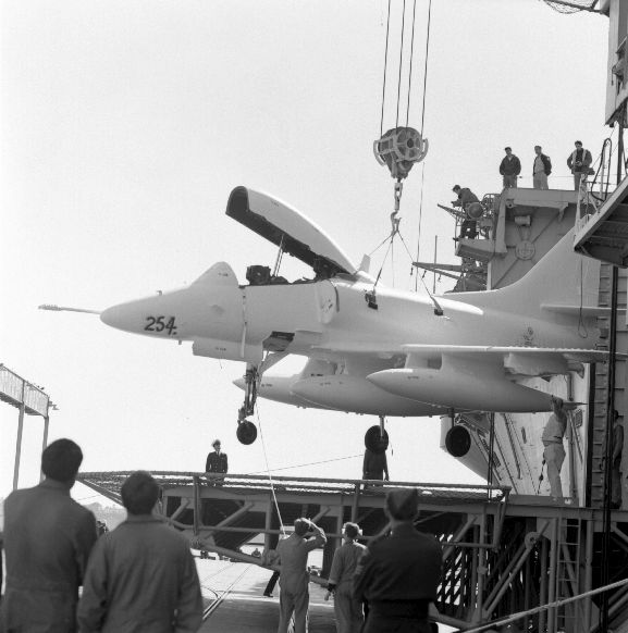 WhG7844-70 The delivery of the new Skyhawks. A TA-4K labelled 254 (NZ6254?), being lowered from the aircraft carrier U.S.S. Okinawa. Auckland.
