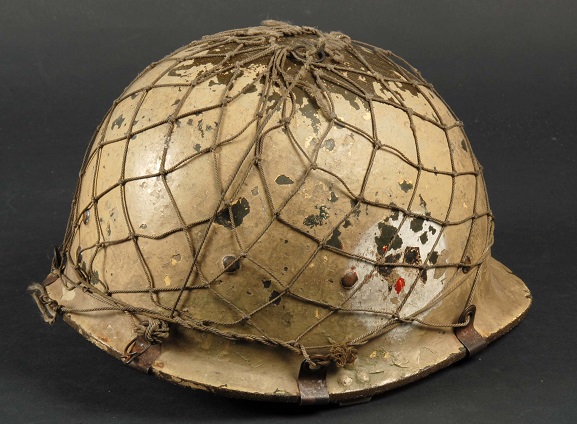 1992-46-p2 Iraqi military helmet, found in the desert after the 1990-91 Gulf War by an RNZAF Air Loadmaster. From the collection of the Air Force Museum of New Zealand.