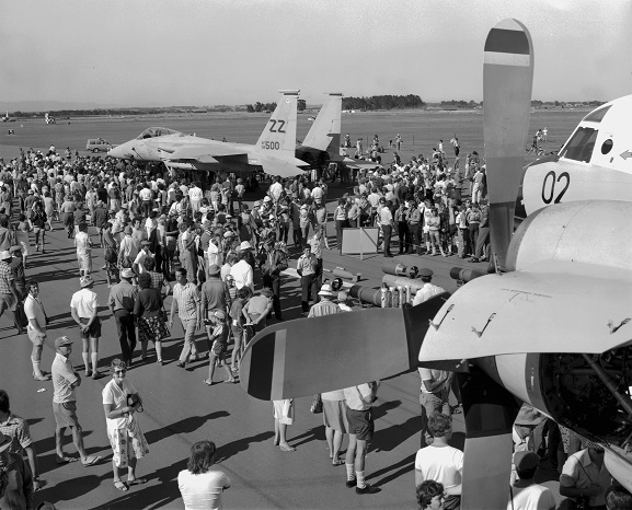 Air Force Day 81 Crowds on the tarmac at Ohakea looking at a USAF F-15, viewed from the wing of No. 5 Squadron Orion NZ4202. Image ref OhG730-81, RNZAF Official.