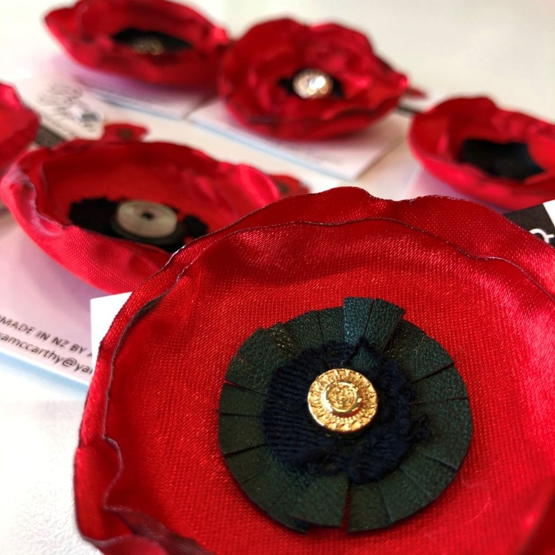 promise poppy brooches