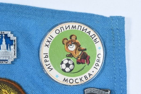 New to the collection web detail Close up of Misha the Bear badge